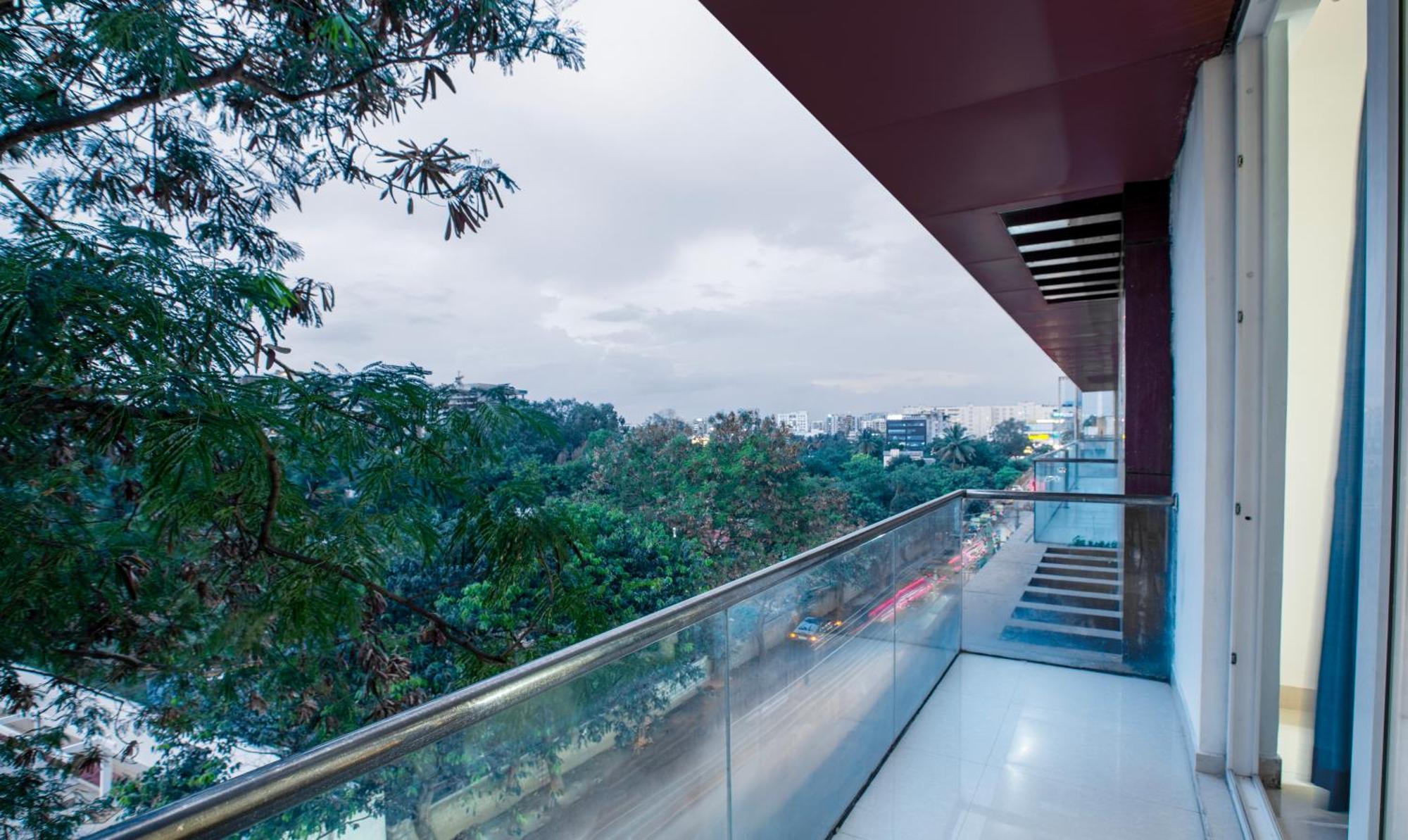 Treebo New Plus Point Hotel Bangalore Exterior photo